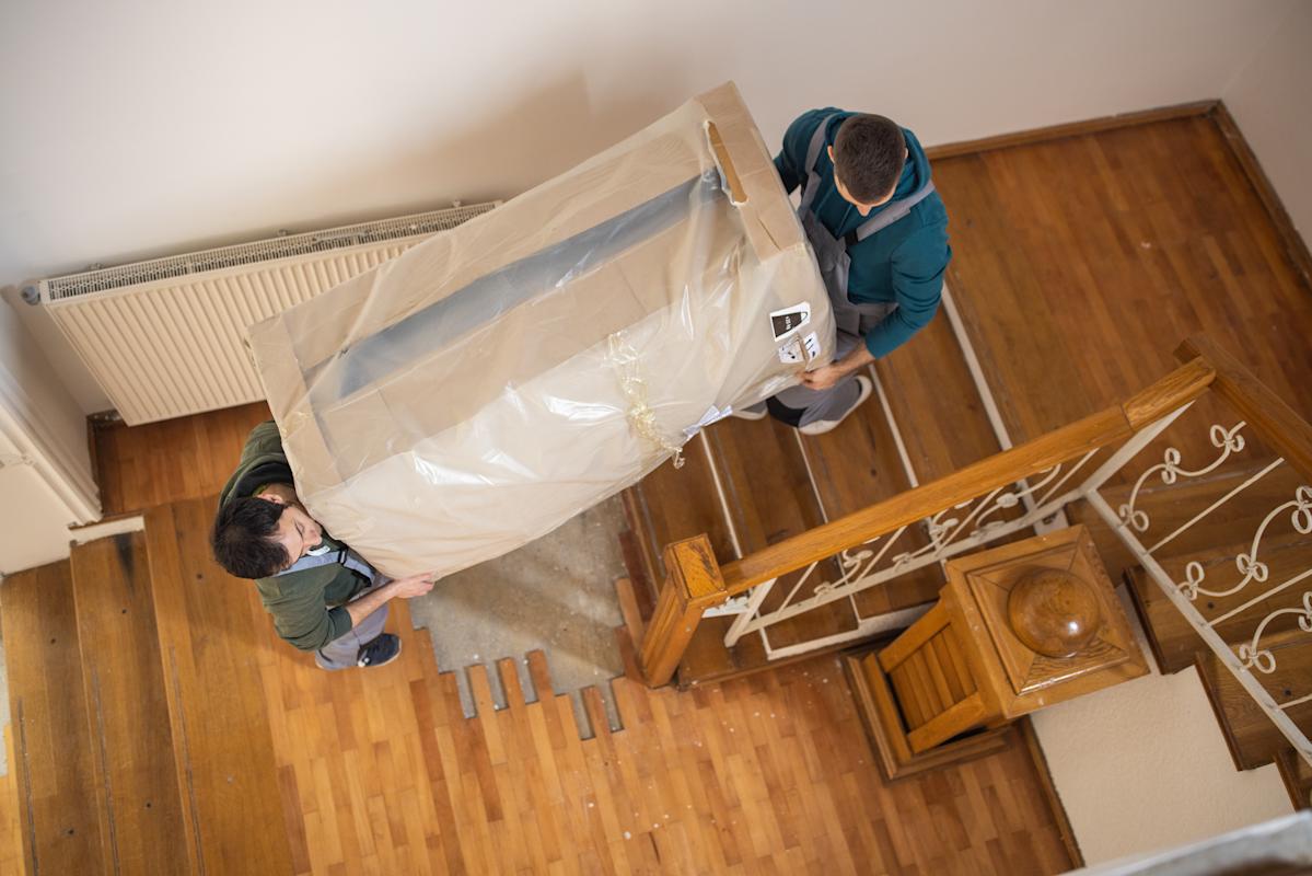 Professional Walk Up Apartment Moving Service Chelsea Manhattan NY moving furniture through a walk-up apartment