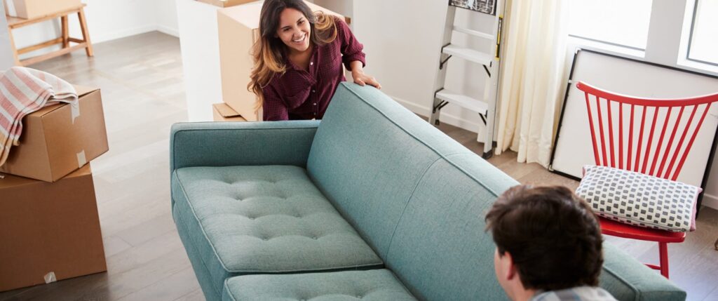 Scheduled Furniture Delivery Service Long Island NY delivering a sofa to a residential home