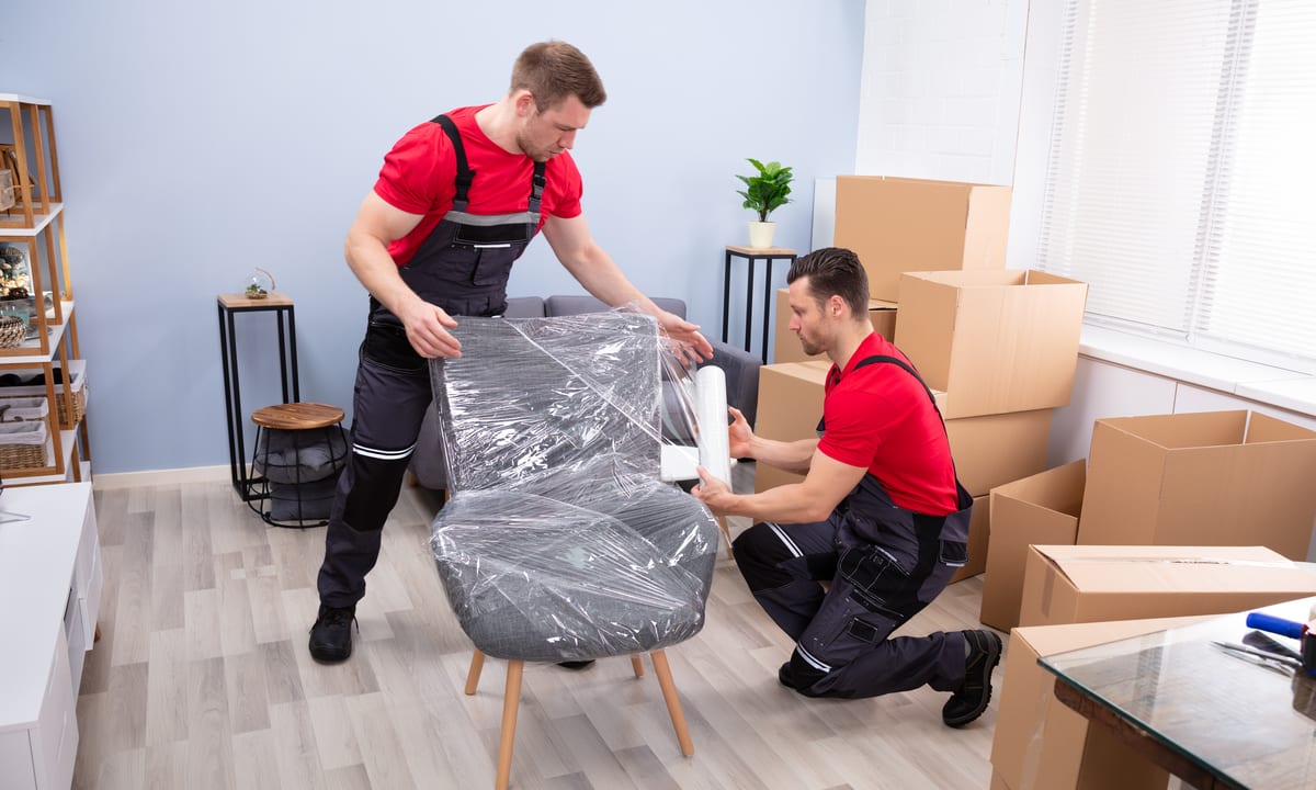 Local Relocation Bradenton, FL movers loading furniture and boxes for a residential move